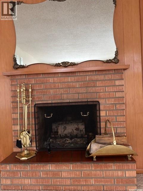706 Balmoral Street, Saskatoon, SK - Indoor Photo Showing Living Room With Fireplace