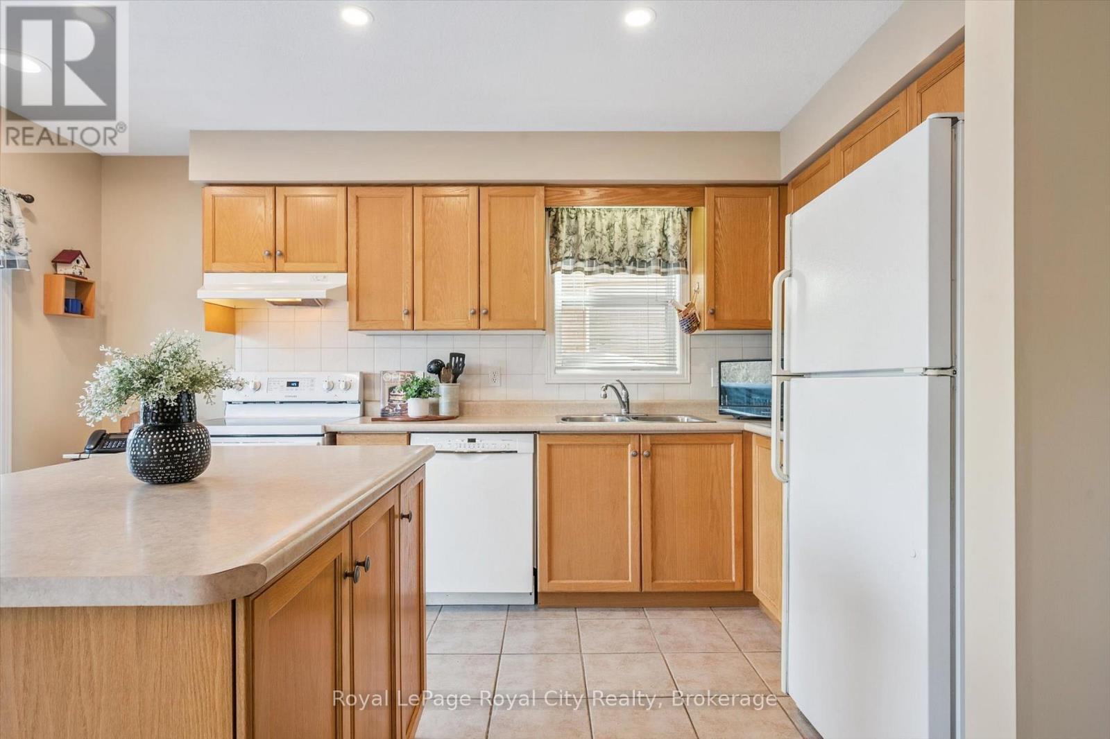 347 Starwood Drive, Guelph (Grange Road), ON - Indoor Photo Showing Kitchen With Double Sink