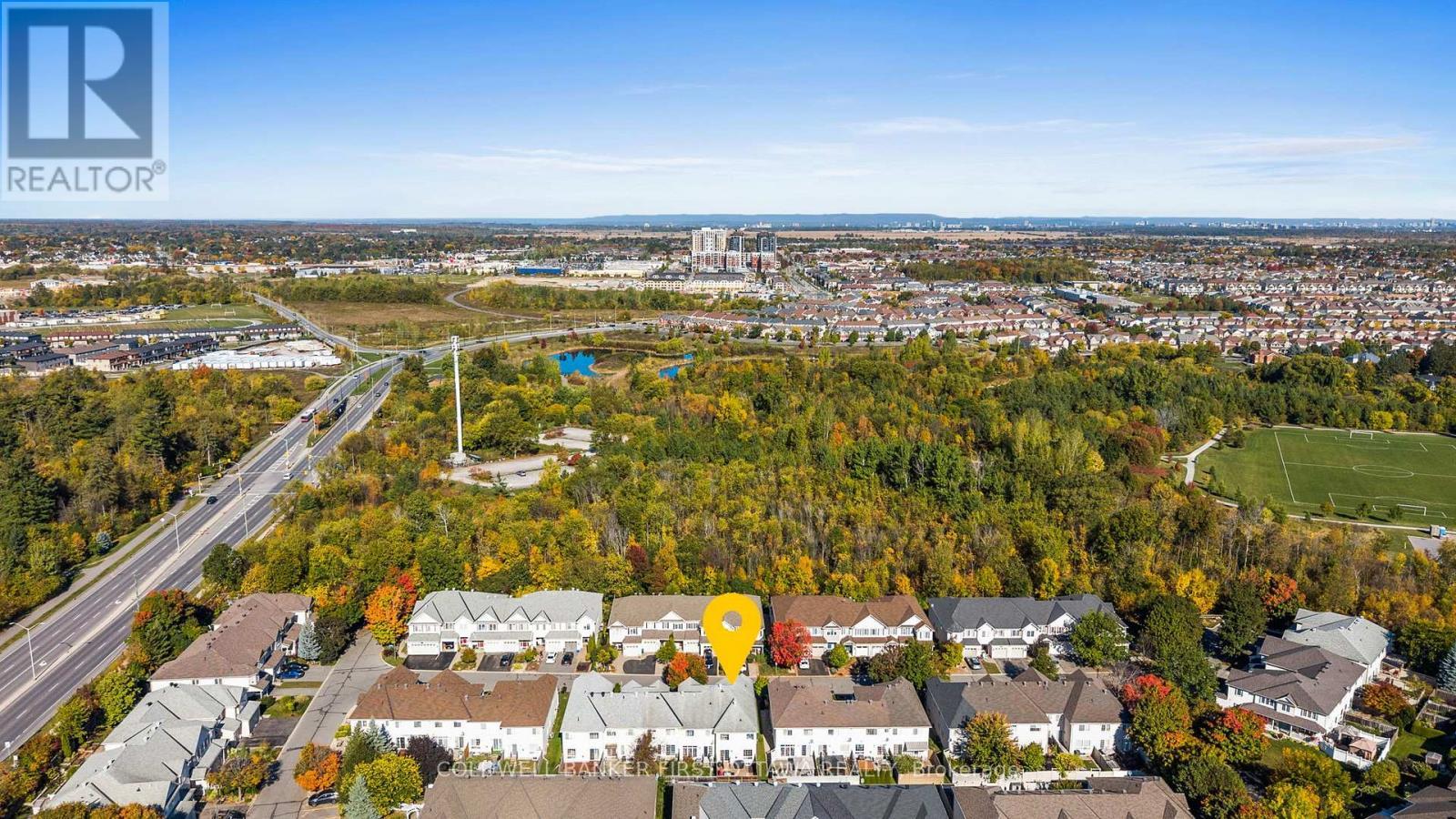 Located nearby all shopping & Barrhaven amenities! - 20 Fieldberry Private, Ottawa, ON - Outdoor With View