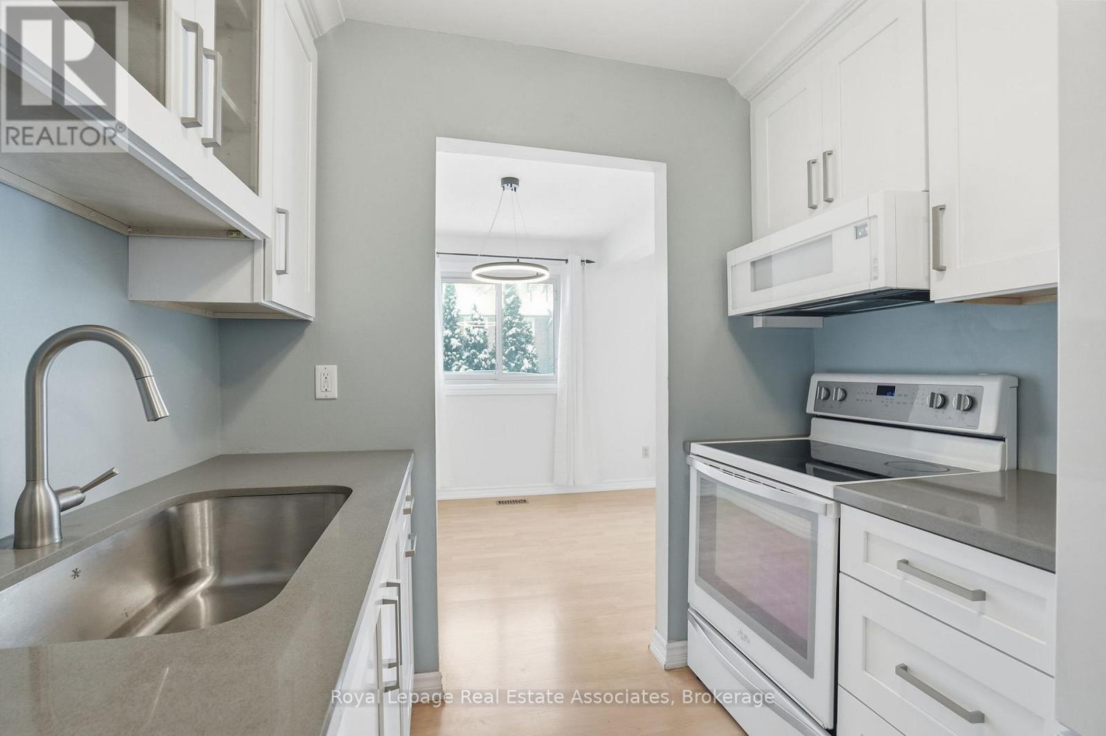 66A - 1460 Garth Street, Hamilton, ON - Indoor Photo Showing Kitchen With Double Sink