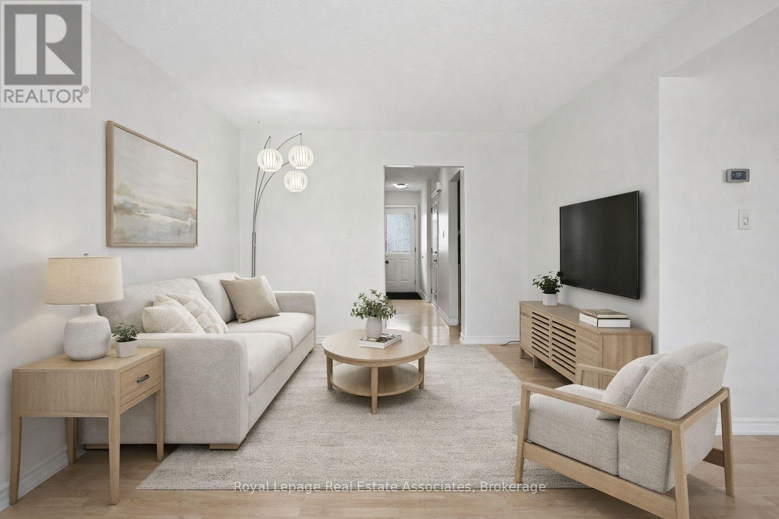 Virtually staged - 66A - 1460 Garth Street, Hamilton, ON - Indoor Photo Showing Living Room