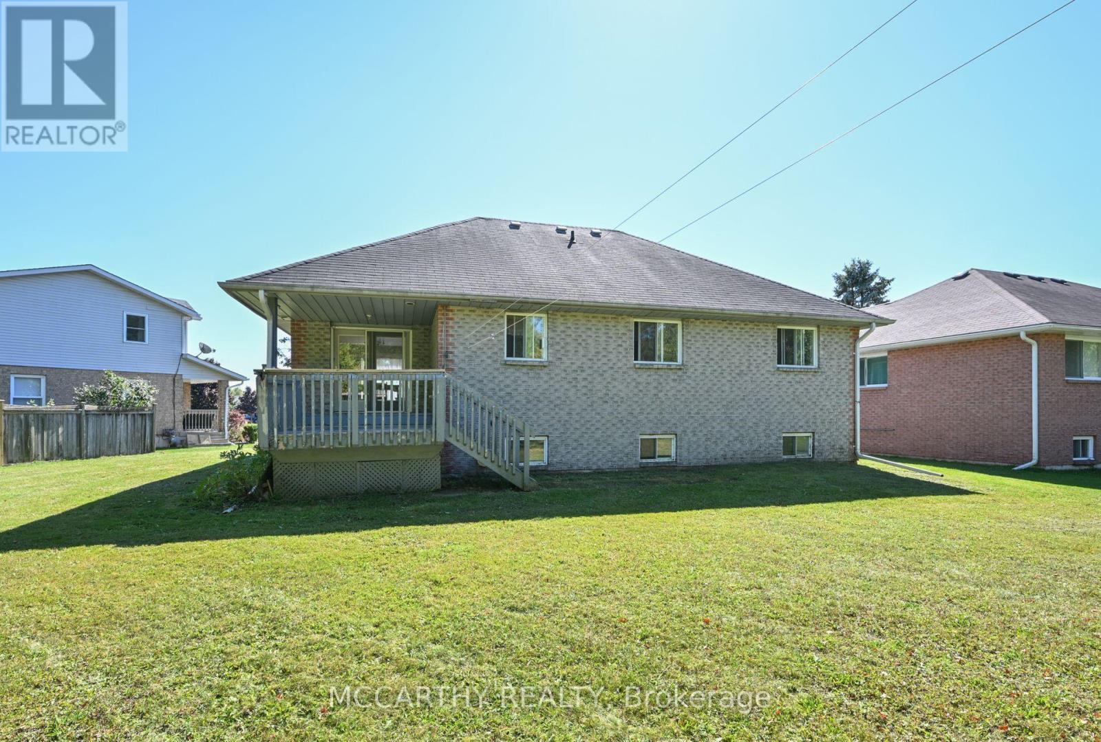 Large yard, covered deck - 28 Wilson Crescent, Southgate, ON - Outdoor With Deck Patio Veranda With Exterior