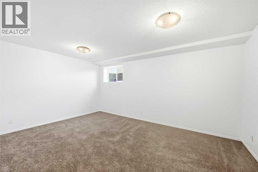 132 Royal Birch Mount Nw, Calgary, AB - Indoor Photo Showing Other Room