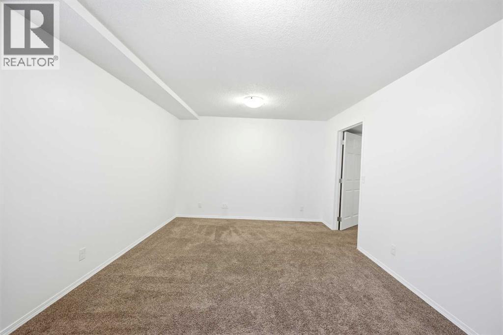 132 Royal Birch Mount Nw, Calgary, AB - Indoor Photo Showing Other Room