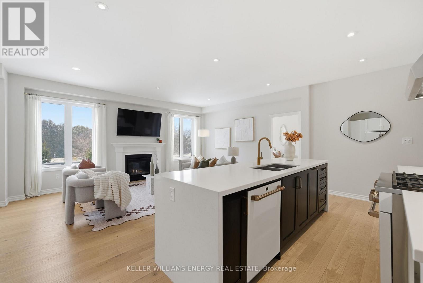44 Priory Drive, Whitby, ON - Indoor Photo Showing Kitchen With Fireplace With Double Sink