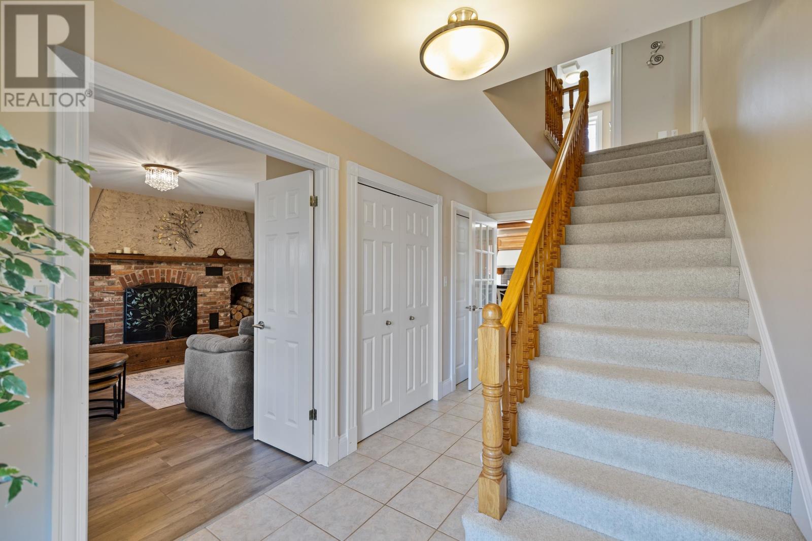 138 Cathy Drive, Cornwall, PE - Indoor Photo Showing Other Room With Fireplace