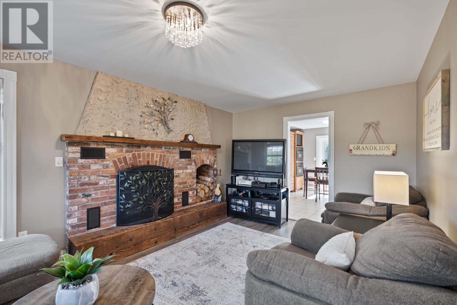 138 Cathy Drive, Cornwall, PE - Indoor Photo Showing Living Room With Fireplace