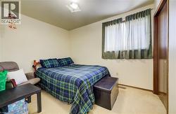 Bedroom 3 with light colored carpet -