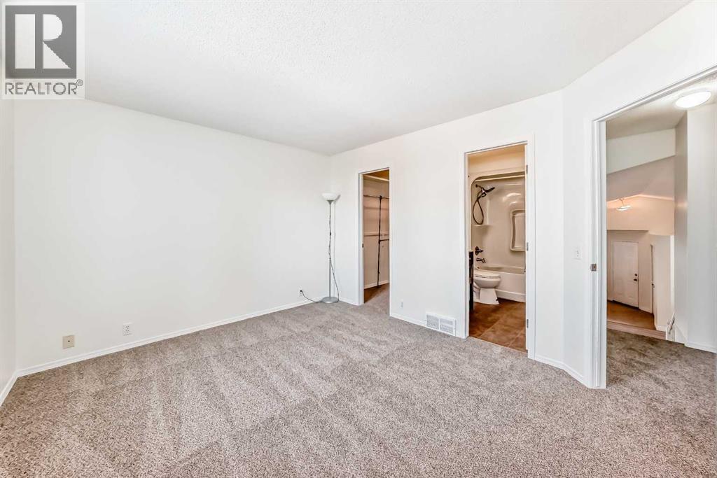 Master Bedroom - 9875 Hidden Valley Drive Nw, Calgary, AB - Indoor Photo Showing Other Room