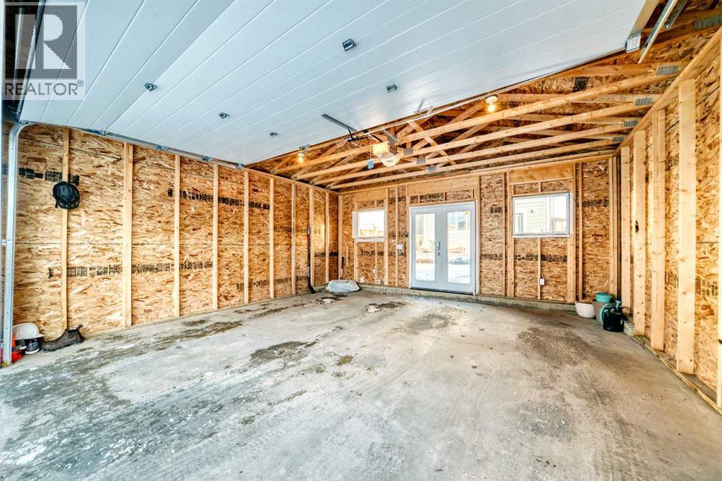 77 Marquis Common Se, Calgary, AB - Indoor Photo Showing Garage