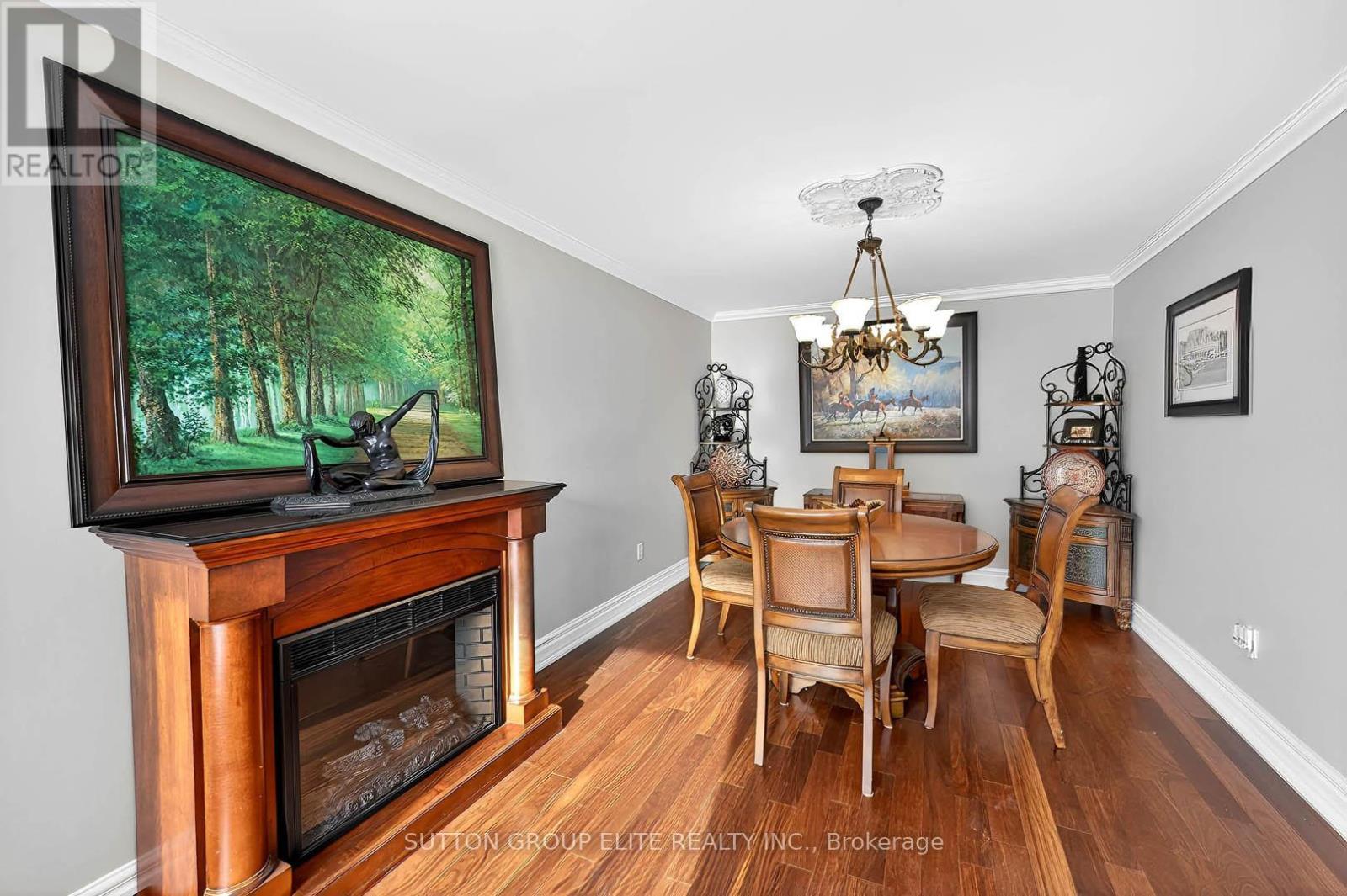 5204 Swiftcurrent Trail, Mississauga, ON - Indoor Photo Showing Dining Room With Fireplace