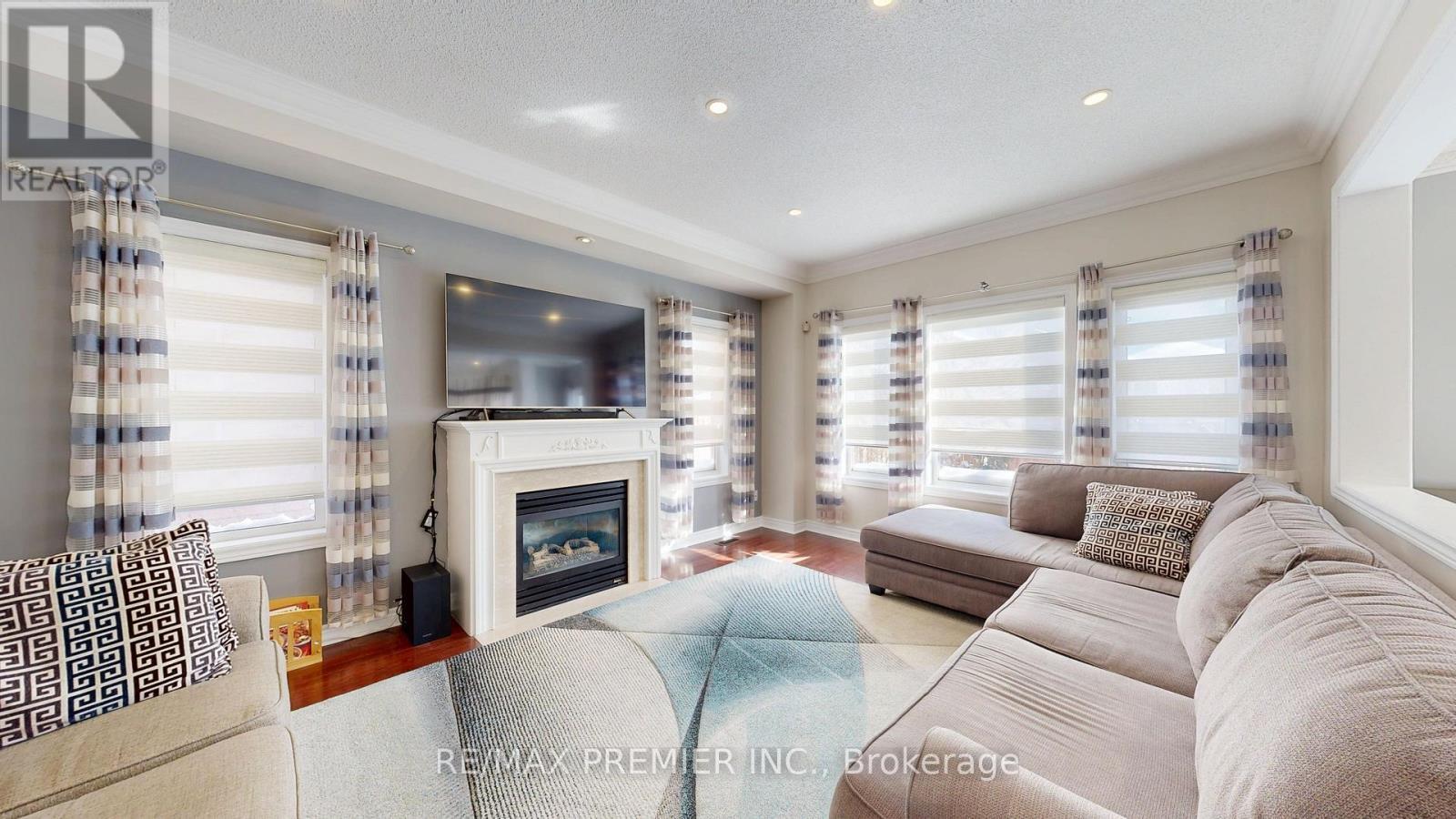 11 Charger Lane, Brampton, ON - Indoor Photo Showing Living Room With Fireplace