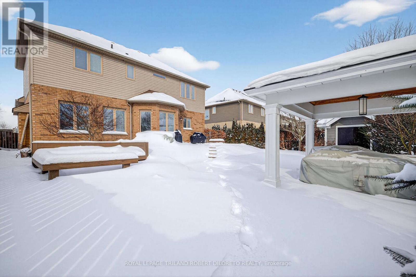 Rear yard - winter view - 56 Fieldstone Crescent S, Middlesex Centre (Komoka), ON - Outdoor