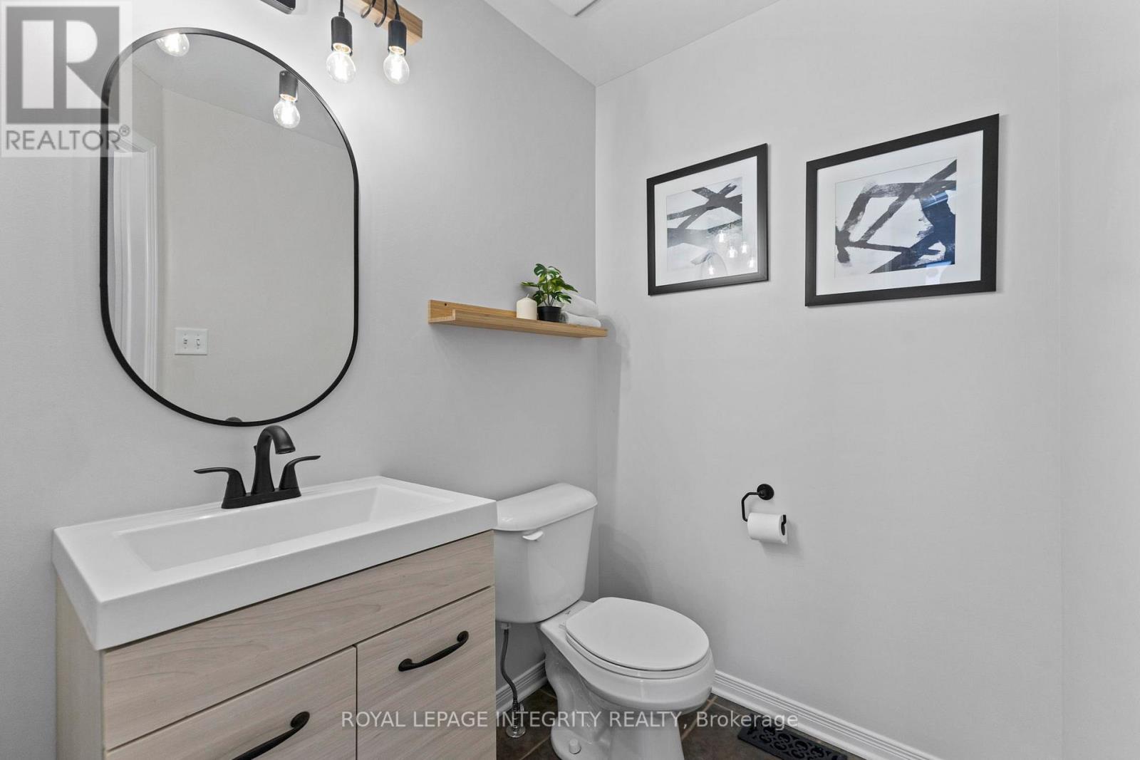 Shared bathroom 1 of 2 (downstairs, half bathroom) - 30 Goldthorpe Private, Ottawa, ON - Indoor Photo Showing Bathroom