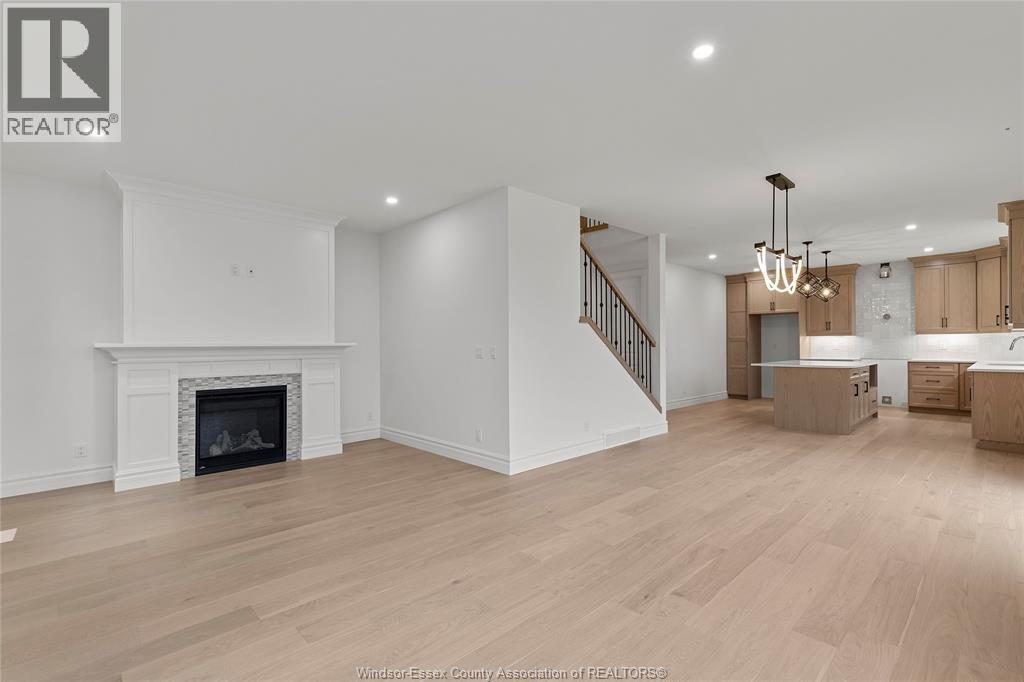 462 Marla Crescent, Lakeshore, ON - Indoor Photo Showing Living Room With Fireplace