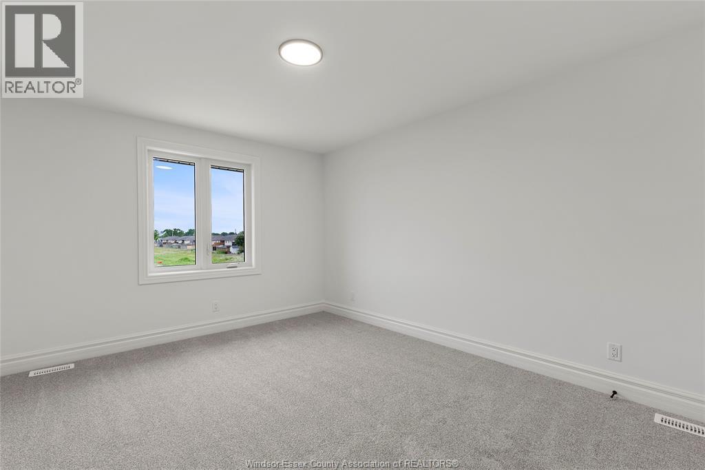 357 Marla Crescent, Lakeshore, ON - Indoor Photo Showing Other Room