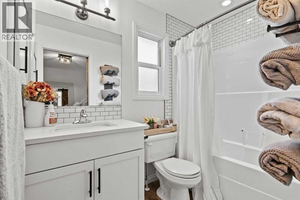 Ensuite to master - 311 Mcleod Crescent, Diamond Valley, AB - Indoor Photo Showing Bathroom