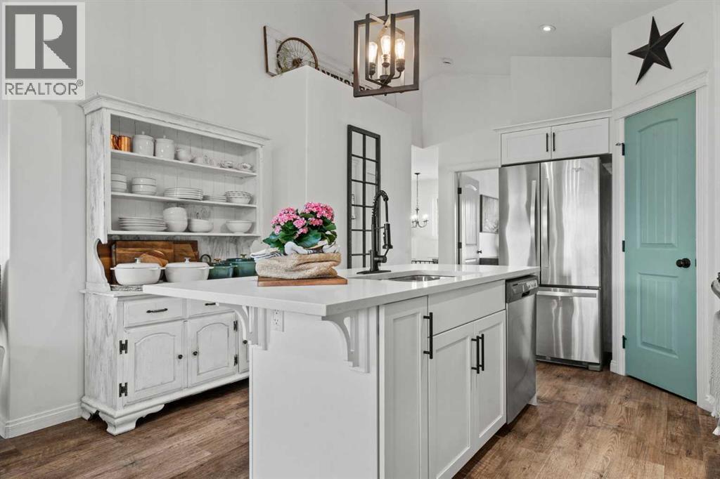 Generous pantry - 311 Mcleod Crescent, Diamond Valley, AB - Indoor Photo Showing Kitchen