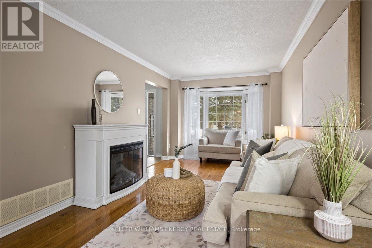 2 Resnik Drive, Clarington (Newcastle), ON - Indoor Photo Showing Living Room With Fireplace
