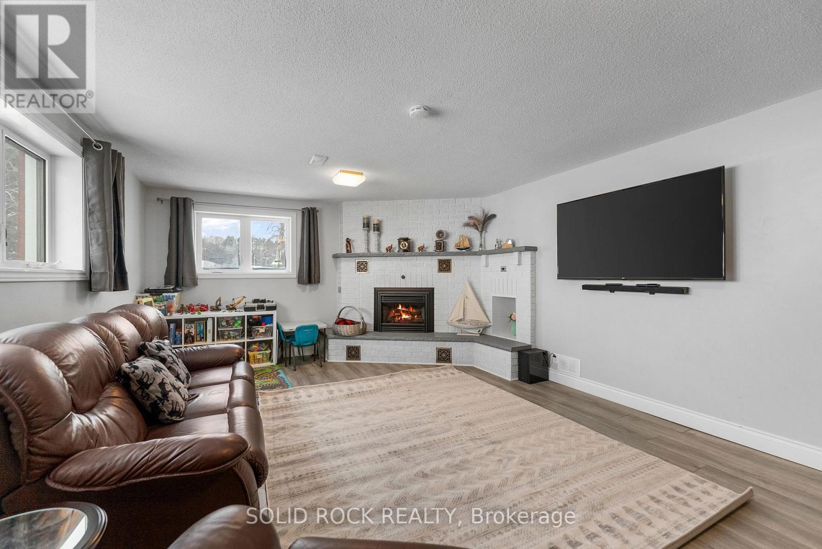 86 Township Park Road, North Algona Wilberforce, ON - Indoor Photo Showing Living Room With Fireplace