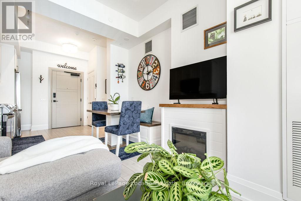 219 - 1 Hume Street, Collingwood, ON - Indoor With Fireplace