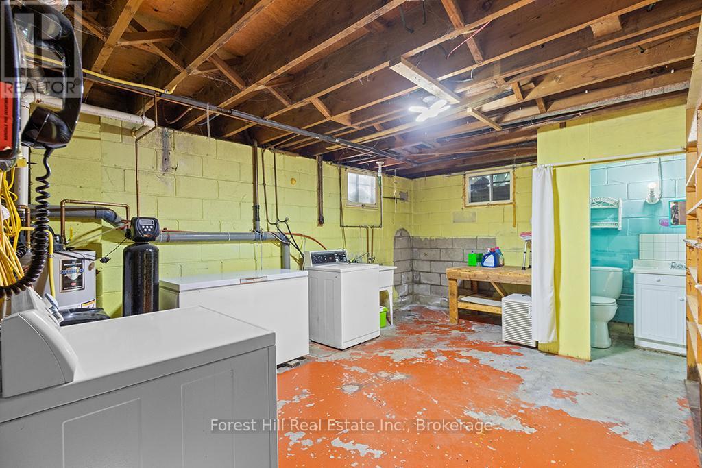 Laundry Area with Powder Room - 58 Edith Avenue, Grey Highlands, ON - Indoor Photo Showing Laundry Room