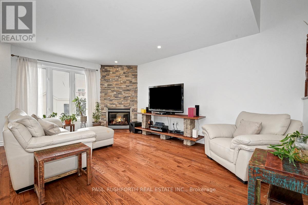 Living Room - 421 Jasper Crescent, Clarence-Rockland, ON - Indoor Photo Showing Living Room With Fireplace