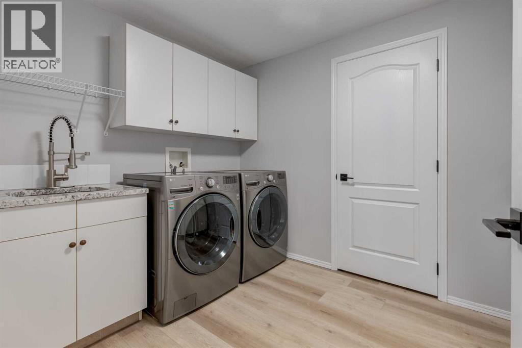 79 Discovery Ridge Park Sw, Calgary, AB - Indoor Photo Showing Laundry Room