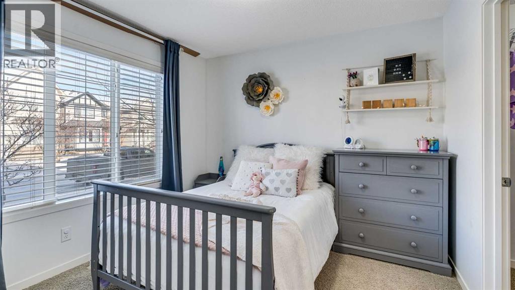 389 Cranberry Circle Se, Calgary, AB - Indoor Photo Showing Bedroom