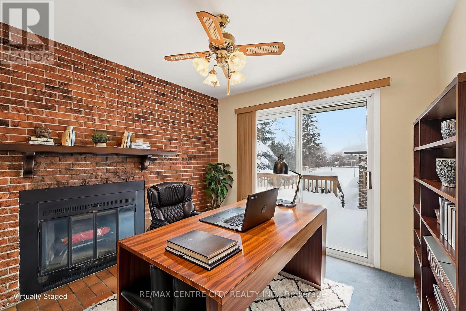 Den (previously a 3rd bedroom) (virtually staged) - 81 Clive Road, Kitchener, ON - Indoor With Fireplace