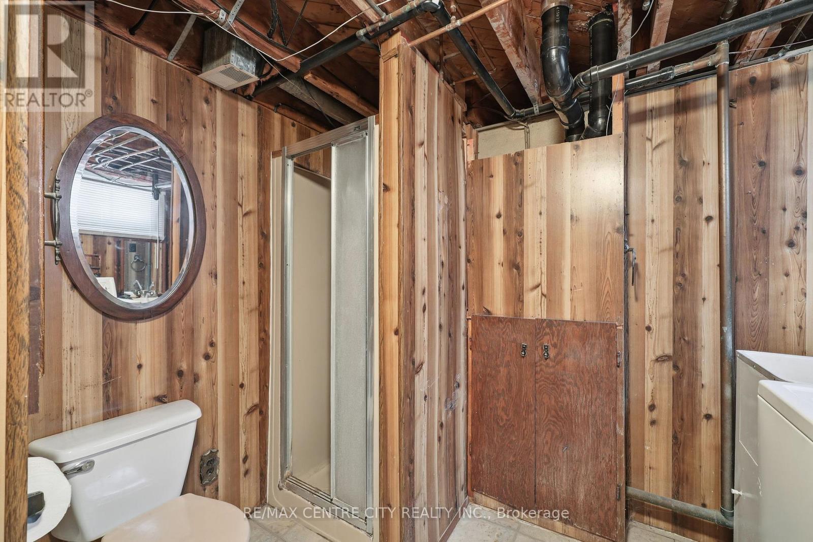 laundry room combined with washroom - 81 Clive Road, Kitchener, ON - Indoor Photo Showing Basement