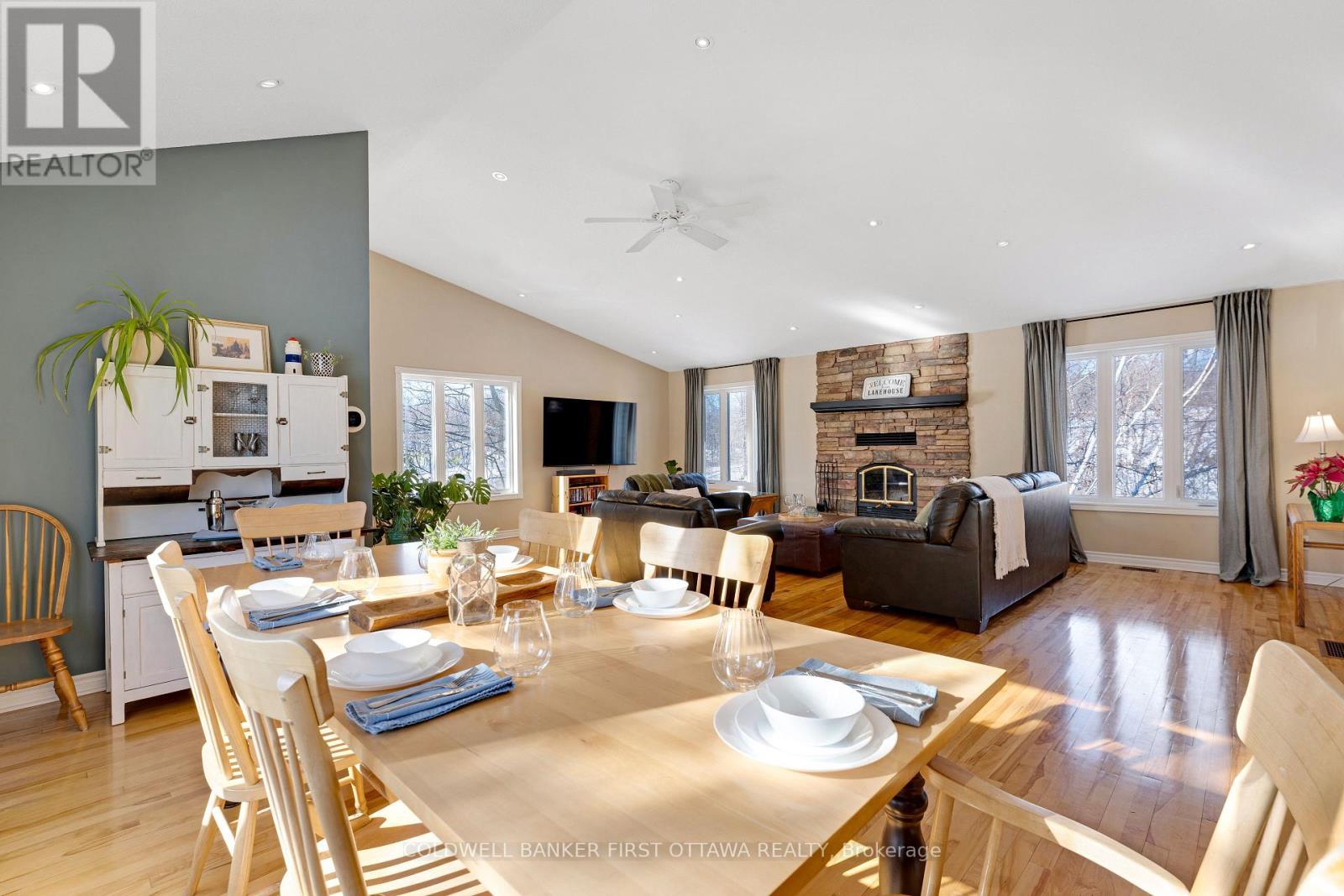 Open sightlines - 100 Nagle Way, Tay Valley, ON - Indoor Photo Showing Other Room With Fireplace