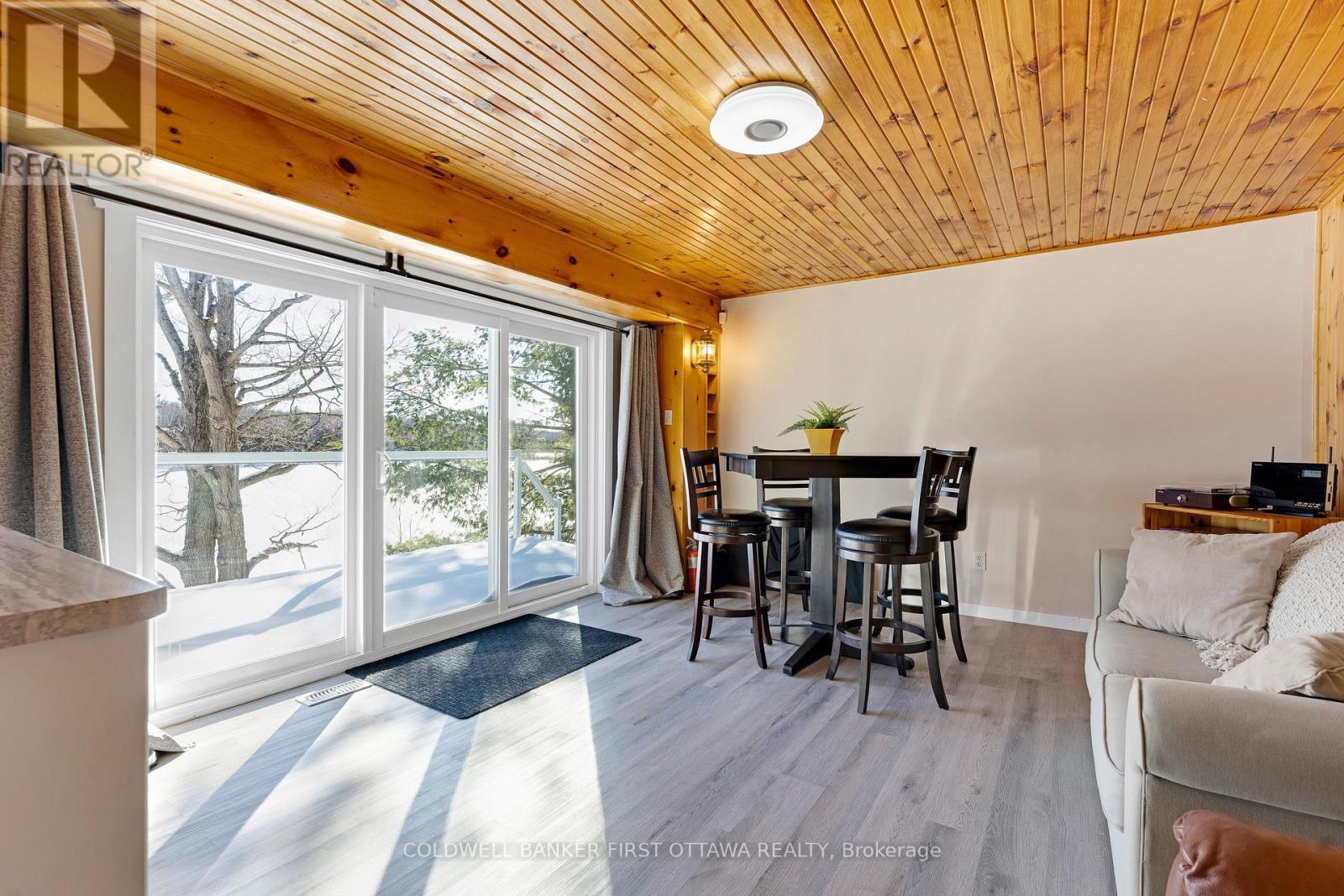 Lower level family room, or bedroom, with deck - 100 Nagle Way, Tay Valley, ON - Indoor