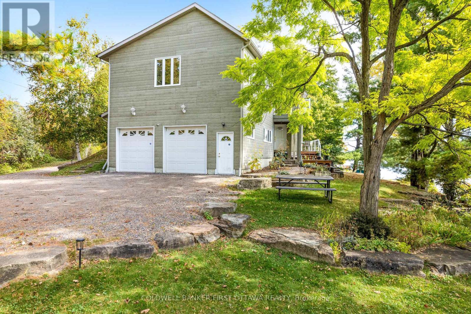 Landscaped yard for summer gatherings - 100 Nagle Way, Tay Valley, ON - Outdoor