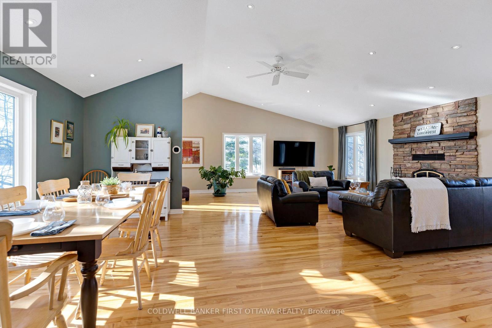 Great Room soaring 18' high ceiling - 100 Nagle Way, Tay Valley, ON - Indoor With Fireplace