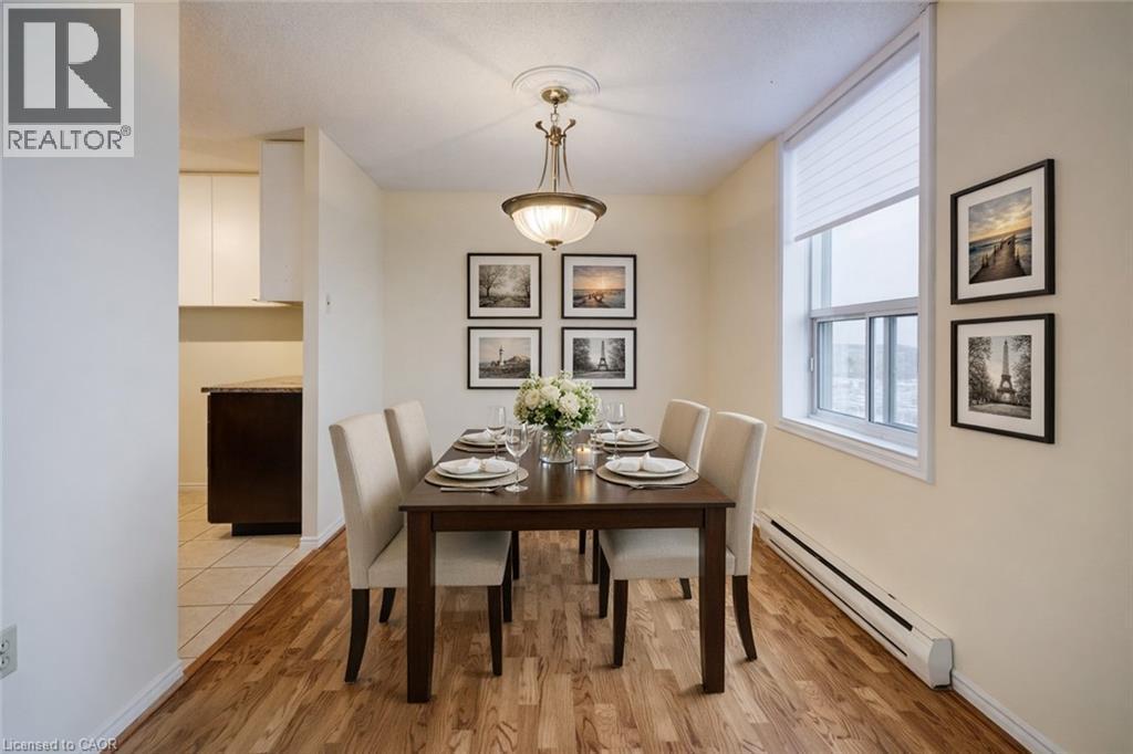 AI Generated staged Photo - 55 Green Valley Drive Unit# 1710, Kitchener, ON - Indoor Photo Showing Dining Room