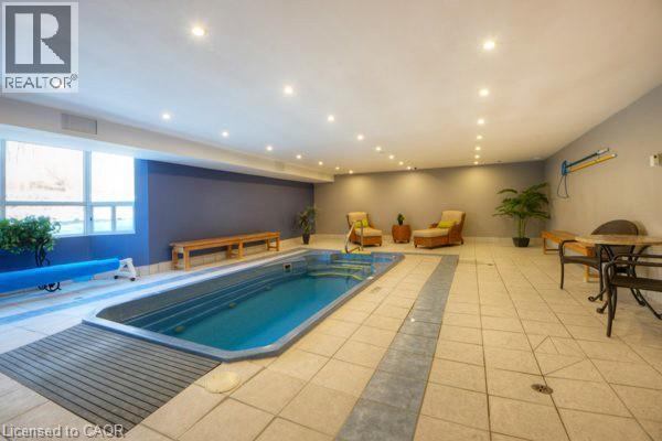 55 Green Valley Drive Unit# 1710, Kitchener, ON - Indoor Photo Showing Other Room With In Ground Pool