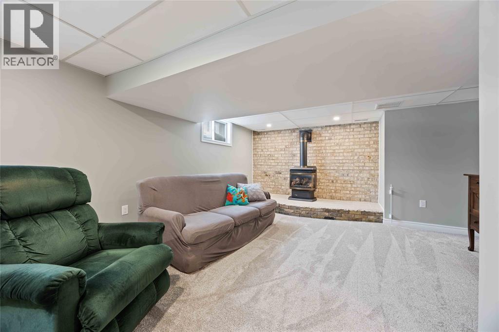 8108 Hillsboro Road, Plympton-Wyoming, ON - Indoor With Fireplace