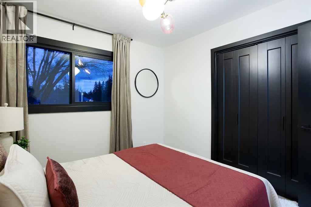 2416 Palliser Drive Sw, Calgary, AB - Indoor Photo Showing Bedroom