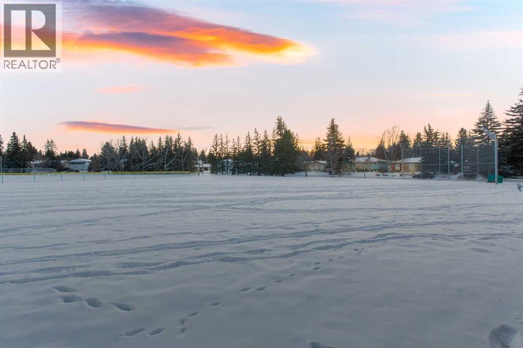 2416 Palliser Drive Sw, Calgary, AB - Outdoor With Body Of Water With View