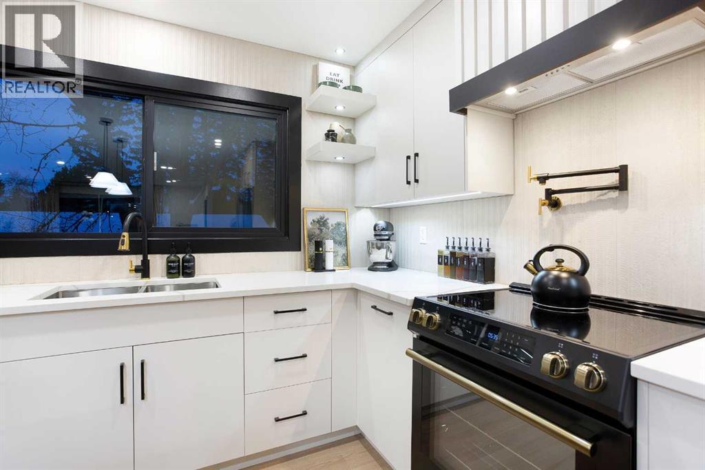 2416 Palliser Drive Sw, Calgary, AB - Indoor Photo Showing Kitchen With Double Sink