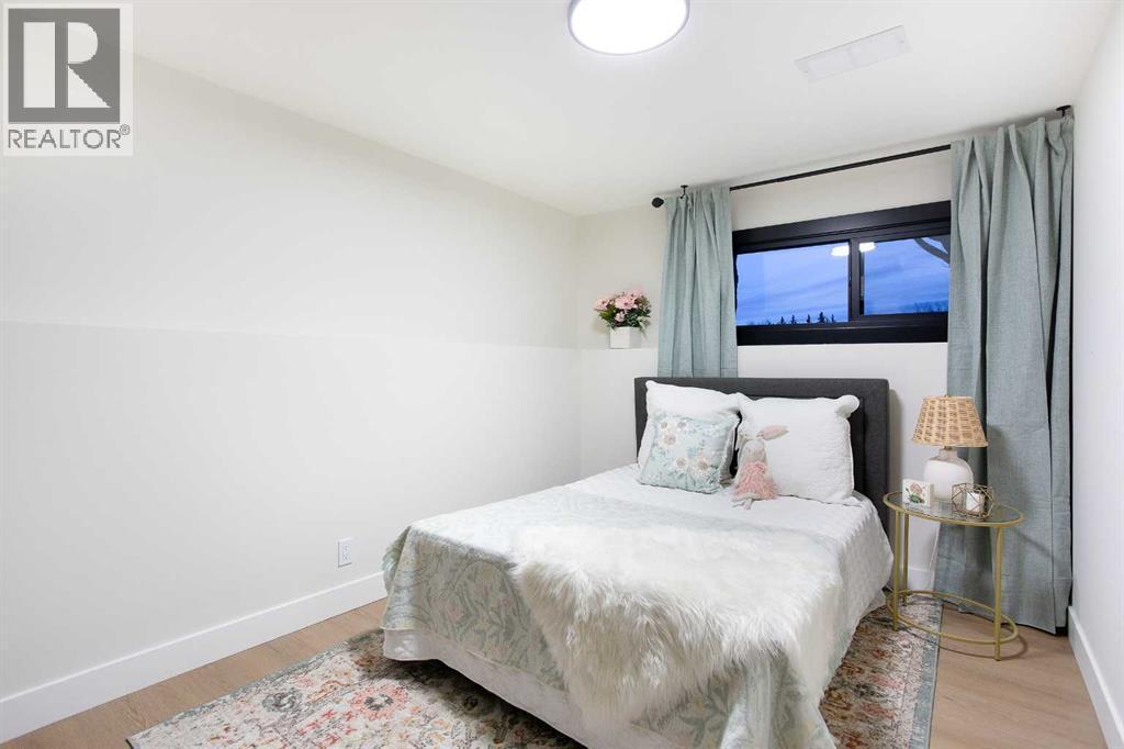 2416 Palliser Drive Sw, Calgary, AB - Indoor Photo Showing Bedroom