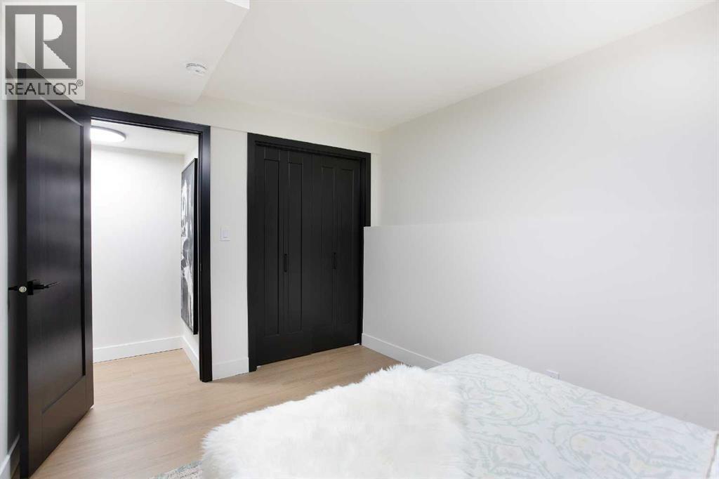 2416 Palliser Drive Sw, Calgary, AB - Indoor Photo Showing Bedroom