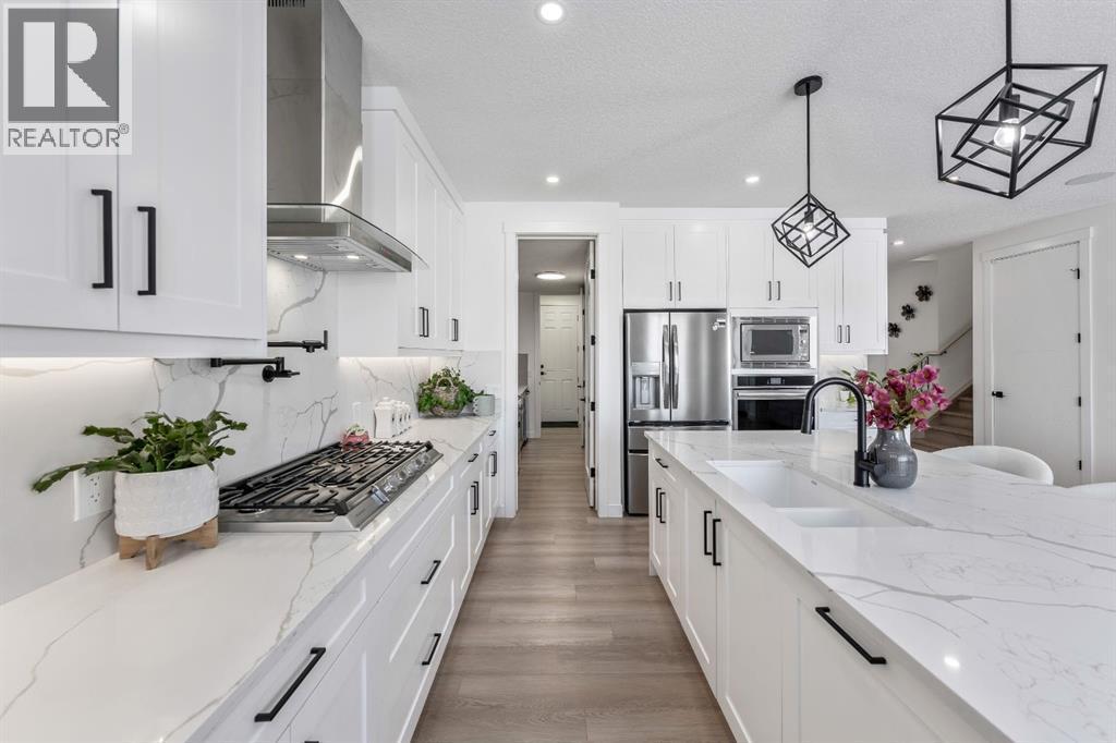 Lots of Storage - 27 Bridges Drive, Langdon, AB - Indoor Photo Showing Kitchen With Upgraded Kitchen