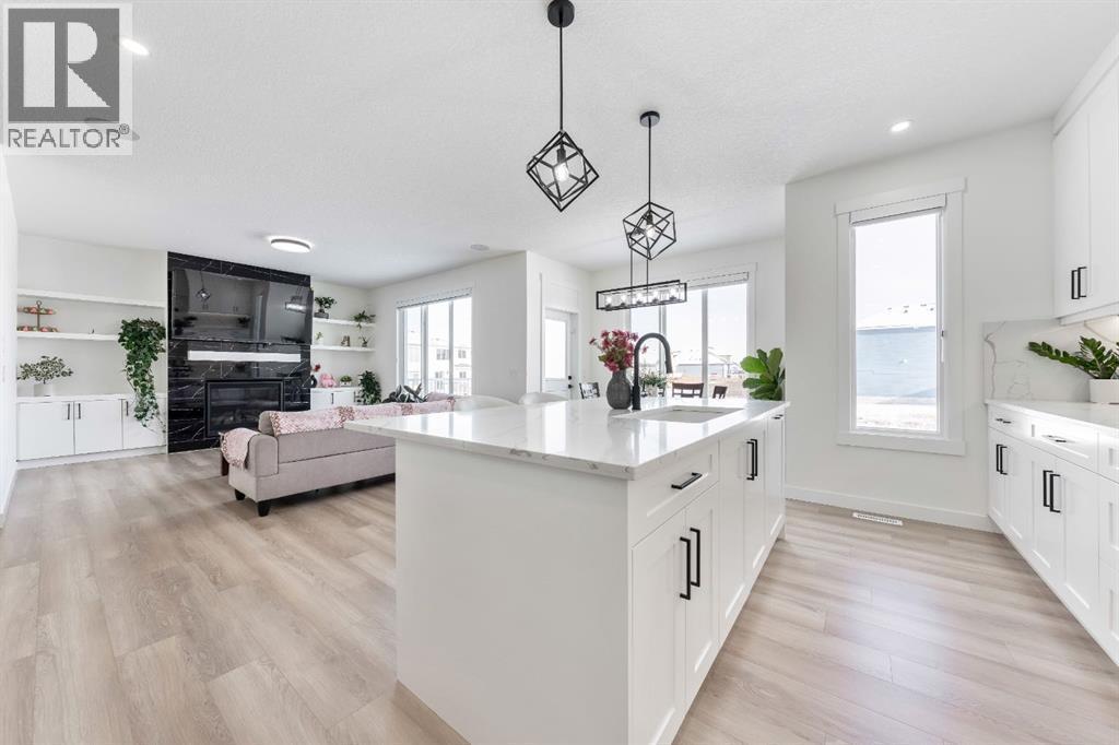 Large Island - 27 Bridges Drive, Langdon, AB - Indoor