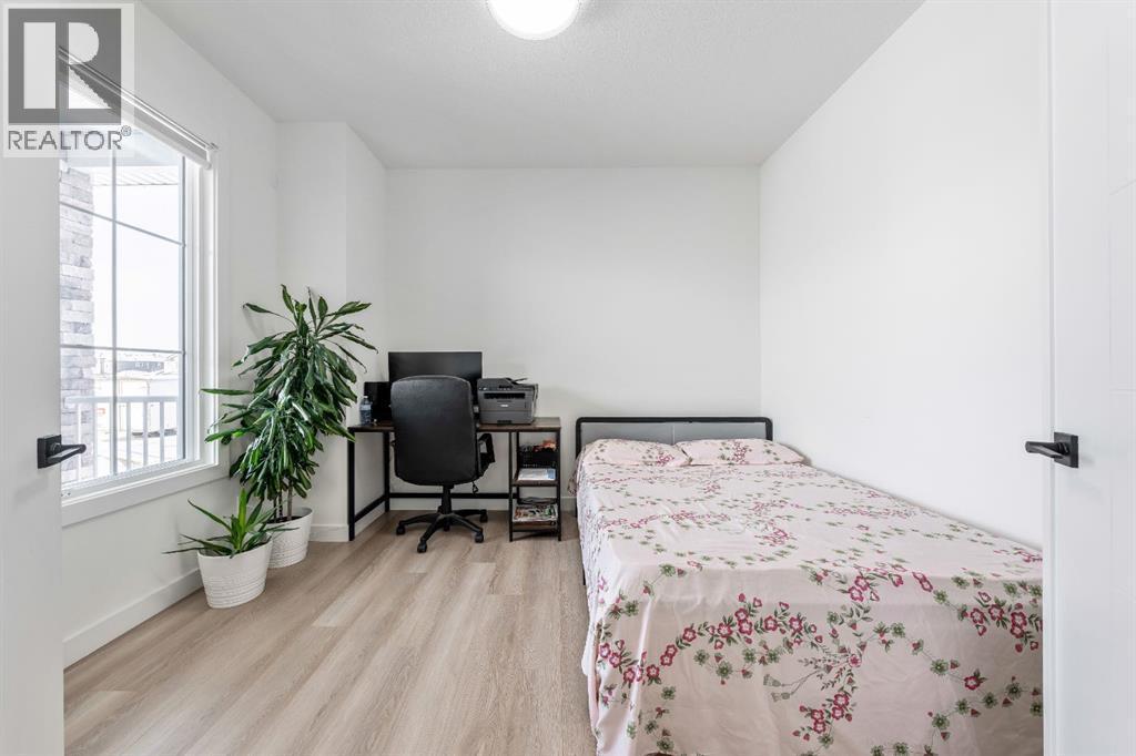 Front Office/ Den/ Flex Room - 27 Bridges Drive, Langdon, AB - Indoor Photo Showing Bedroom