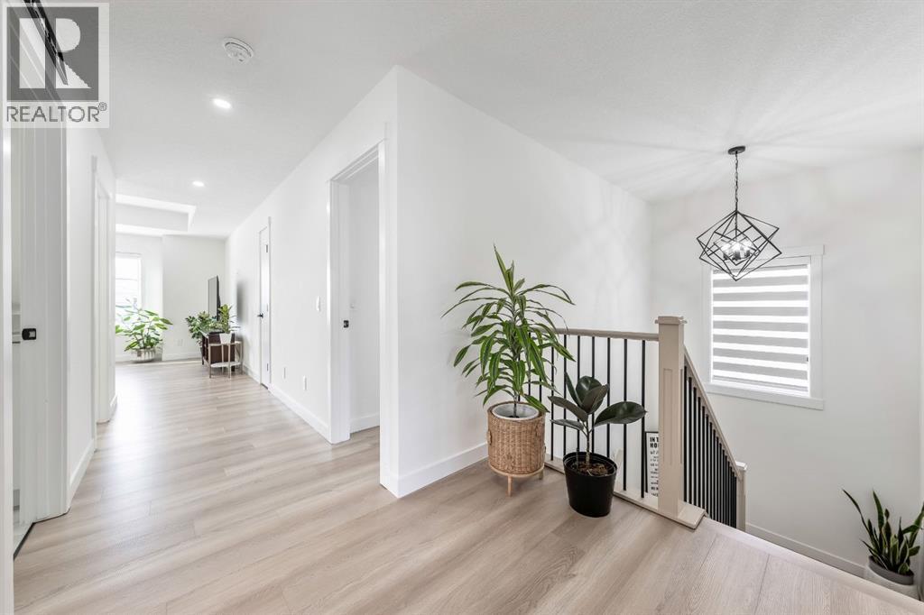 No carpet! - 27 Bridges Drive, Langdon, AB - Indoor Photo Showing Other Room