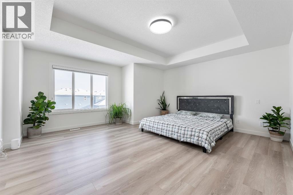 27 Bridges Drive, Langdon, AB - Indoor Photo Showing Bedroom