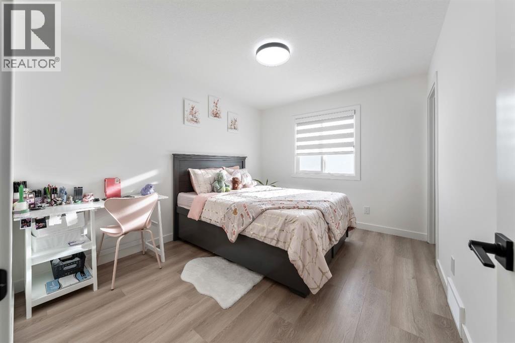27 Bridges Drive, Langdon, AB - Indoor Photo Showing Bedroom