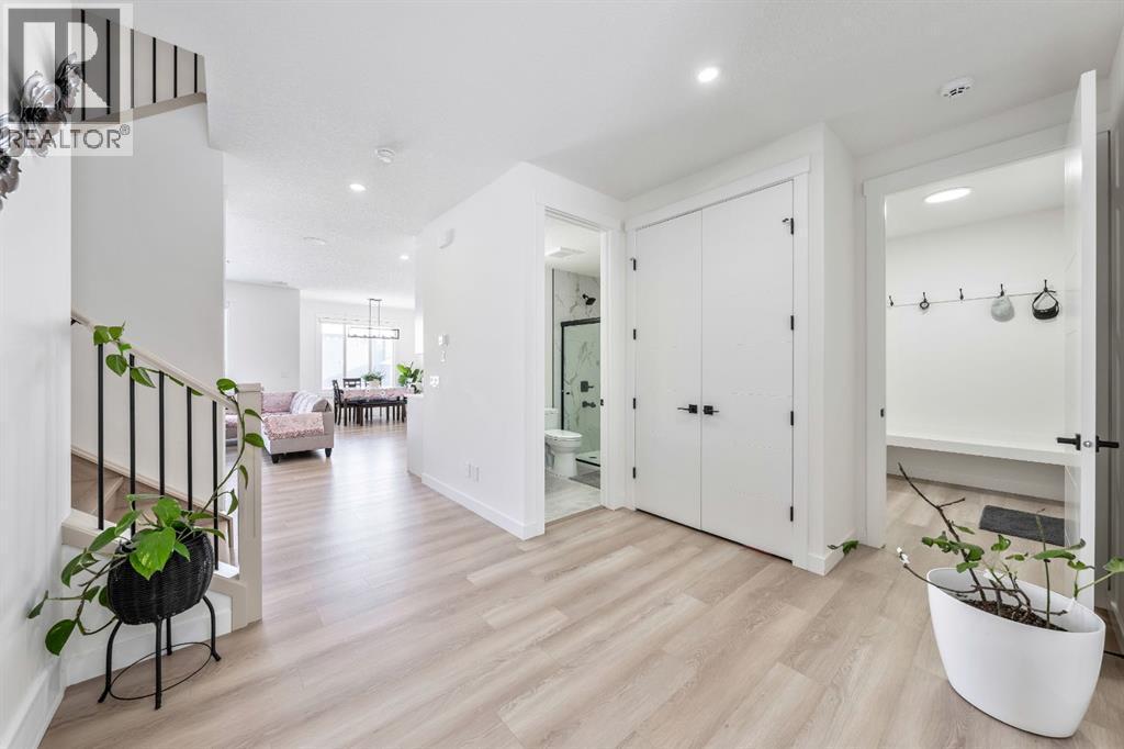 Full Bath on Main - 27 Bridges Drive, Langdon, AB - Indoor Photo Showing Other Room